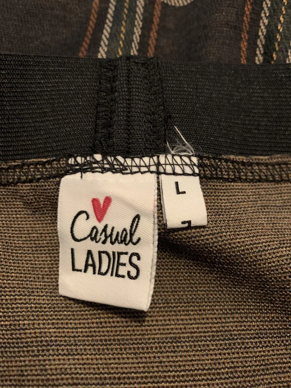 Meerkleurige rok van casual ladies. Maat L. – photo 3
